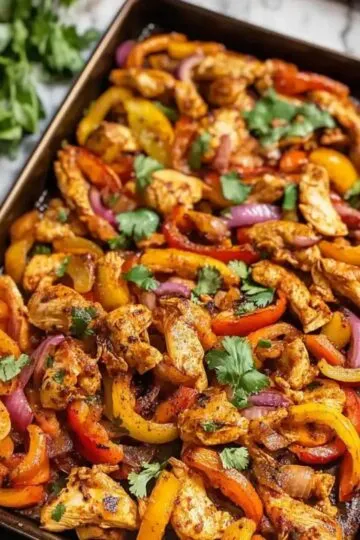 Sheet Pan Chicken Fajitas with roasted bell peppers and cilantro