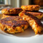 Salmon patties recipe golden crispy exterior broken open showing tender flaky fish interior
