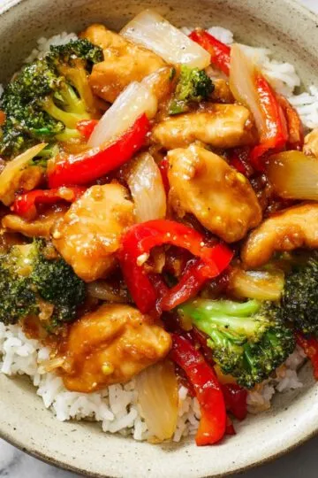 Perfect chicken stir fry image! Here's the optimized content for this specific image: Pinterest Title Options: My Version: Chicken Stir Fry Recipe - Ultimate Quick Dinner Ready in 20 Minutes! Perfect for Busy Weeknights (95 characters - mobile optimized) Your Style Alternative: Best Chicken Stir Fry That's Better Than Takeout! Easy Healthy Dinner with Crisp Vegetables (93 characters) Pinterest Description: This chicken stir fry with vegetables creates the most satisfying weeknight dinner with tender chicken, crisp broccoli, and colorful bell peppers in savory sauce. Ready in just 20 minutes using simple ingredients for restaurant-quality results at home. You'll love this if you need quick healthy dinners that actually taste better than takeout. Perfect when you want easy Asian recipes for busy weeknight meals! Save this time-saving recipe for your next dinner rush! Tags: #chickenstirfry #quickdinner #healthyrecipes #asianrecipes #weeknightmeals Alt Text for Images: Main Recipe Image: "Chicken stir fry recipe with tender chicken pieces, broccoli, red bell peppers, and onions served over steamed rice in ceramic bowl