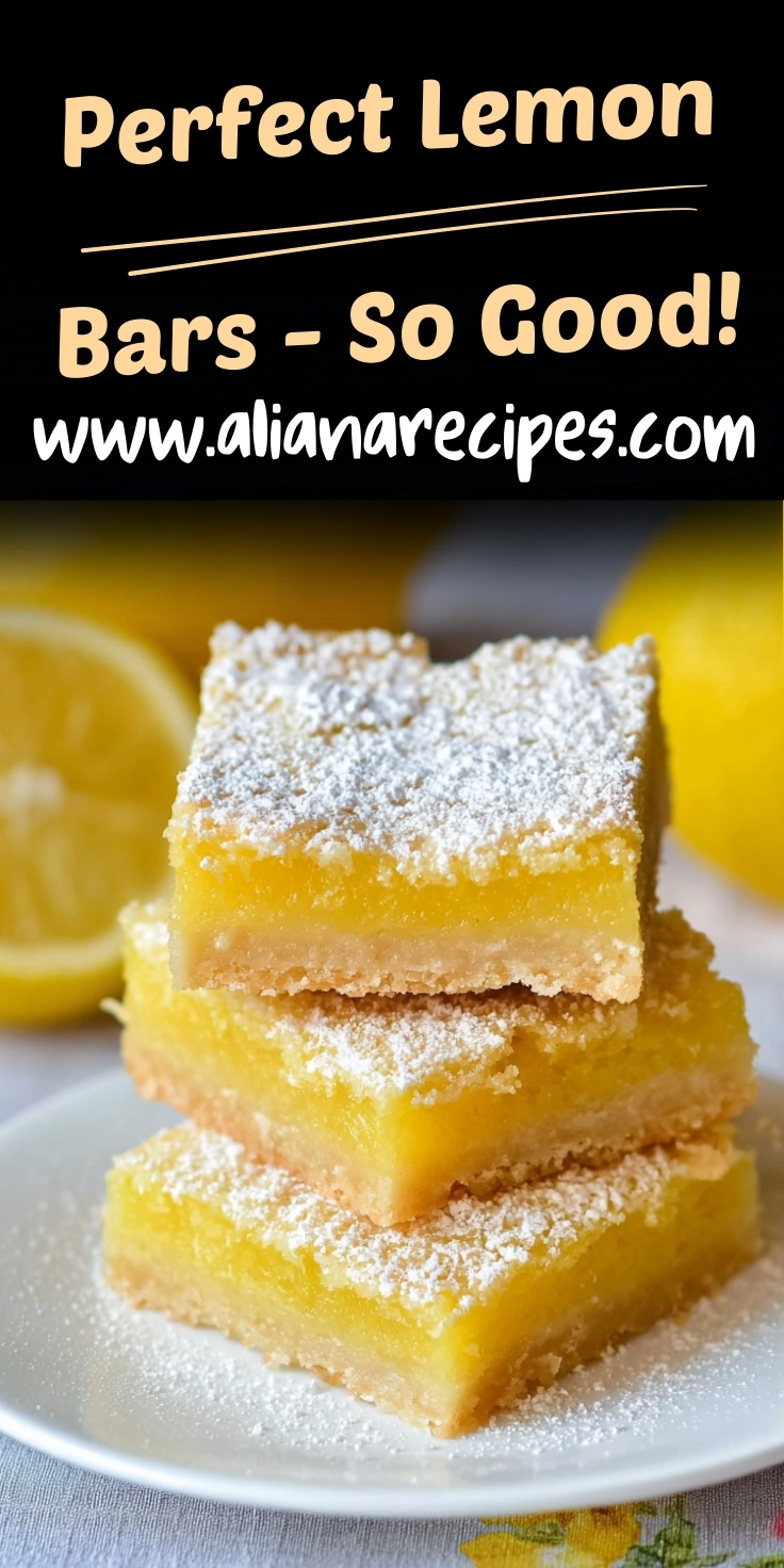 Lemon bars stacked three high showing bright yellow lemon curd filling and golden shortbread crust generously dusted with powdered sugar with fresh lemons and lemon slices in background